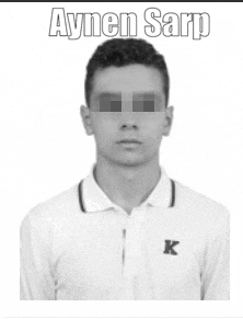 a black and white photo of a young man with aynen sarp written above him