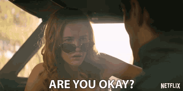 a netflix ad shows a woman asking a man if he 's okay