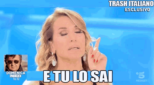 a woman says " e tu lo sai " while pointing her finger