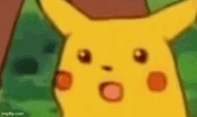 a close up of a cartoon pikachu making a surprised face .