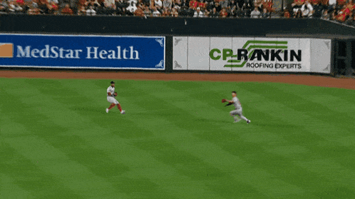 two baseball players wearing jerseys that say milwaukee on them