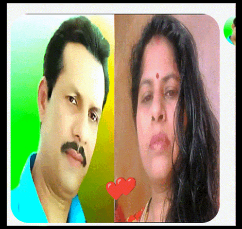 a man and a woman are standing next to each other with a red heart between them