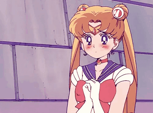 a girl in a sailor suit with a circle on her head