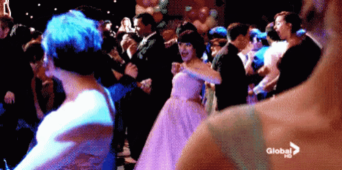 a group of people are dancing at a party with the words global hd on the bottom
