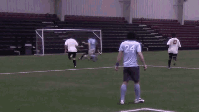 a soccer player with the number 24 on the back of his shirt