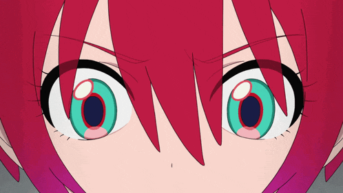 a close up of a girl 's face with pink hair and blue eyes