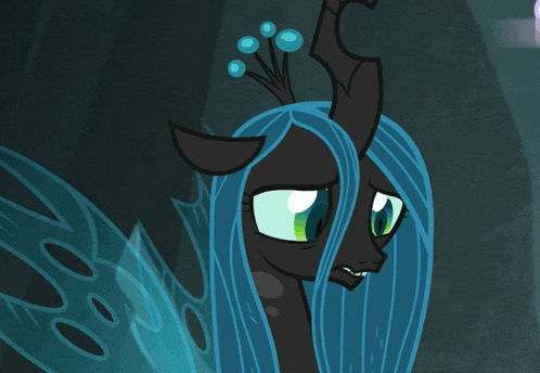 a close up of a cartoon pony with blue hair