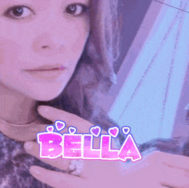 a woman is taking a selfie with the name bella on the bottom