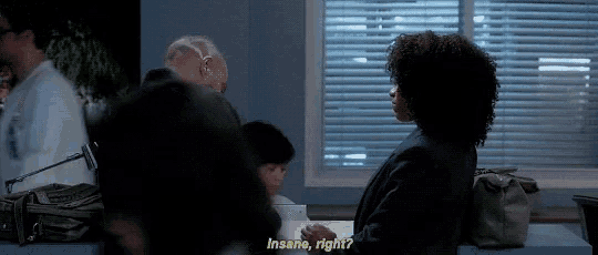a woman is talking to a man in a room and the man is asking her if she is insane , right ?