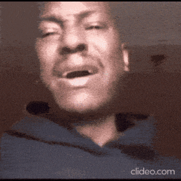 a close up of a man 's face with the website clideo.com in the bottom right corner