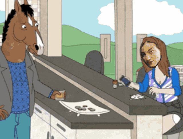 a horse is standing next to a woman sitting at a counter