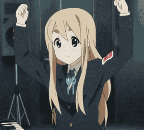 a girl in a school uniform is flexing her muscles in front of a piano .