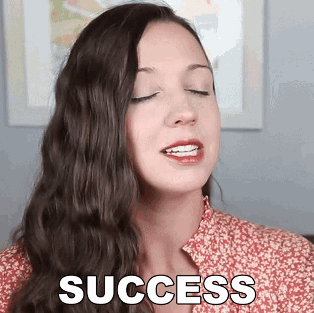 a woman with her eyes closed and the word success on her face