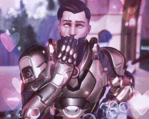 a man in a robot suit is covering his mouth with his hand and surrounded by hearts .