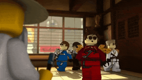 a group of lego figures standing in a room