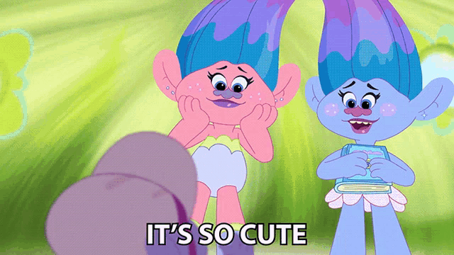 two trolls are standing next to each other with the words it 's so cute