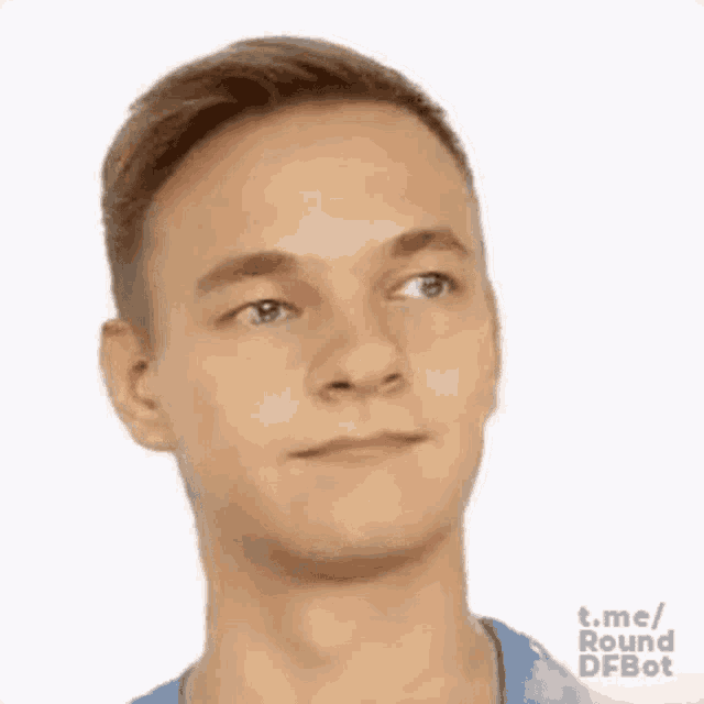 a young man is making a funny face with his eyes closed and his mouth open .