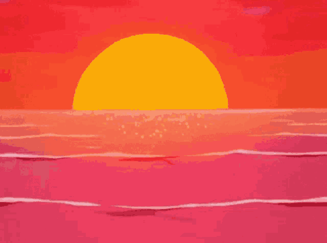 a sunset over the ocean with a large yellow sun