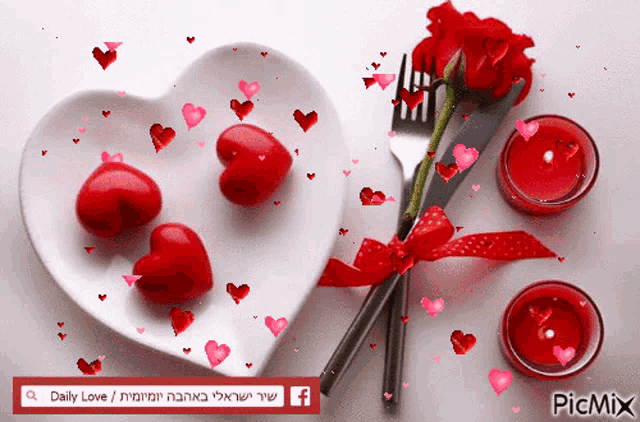 a picture of a heart shaped plate with red hearts and red candles
