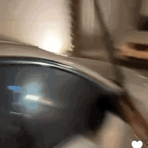 a close up of a car 's rear view mirror