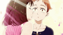 a man and a woman are kissing each other in a cartoon .