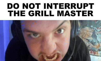 a man wearing headphones is eating a piece of food with the words " do not interrupt the grill master " below him