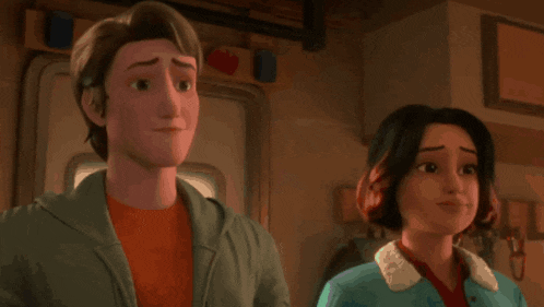 a man and a woman are standing next to each other in front of a door