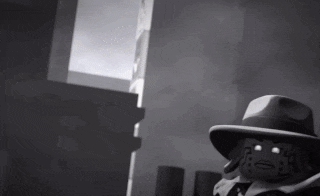 a black and white cartoon character wearing a hat