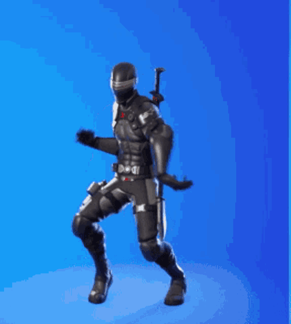 a video game character is standing on a blue background holding a sword .