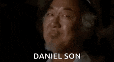 a close up of a man 's face with the words `` daniel son '' written on it .