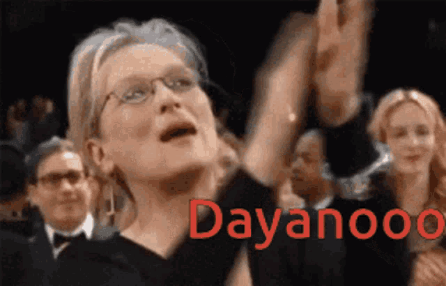a woman applauding with the word dayanooo written in red