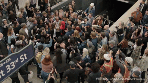 Swarmed By The Crowd Tom Holland GIF - Swarmed By The Crowd Tom Holland Peter Parker GIFs
