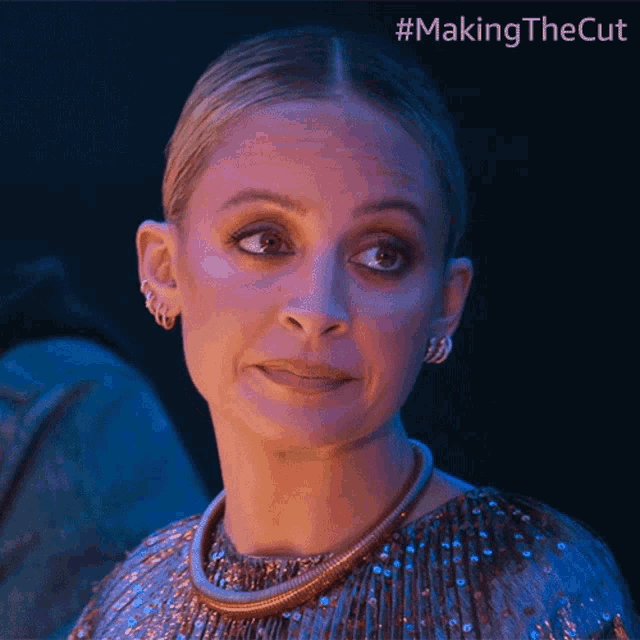 a close up of a woman 's face with the hashtag #making the cut
