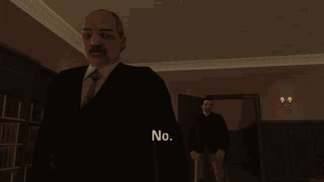 a man in a suit and tie is standing next to another man in a dark room and the man in the suit says no