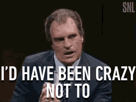 a man in a suit and tie is giving a speech and says `` i 'd have been crazy not to '' .