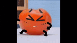 a cartoon tomato with arms and legs and a face drawn on it