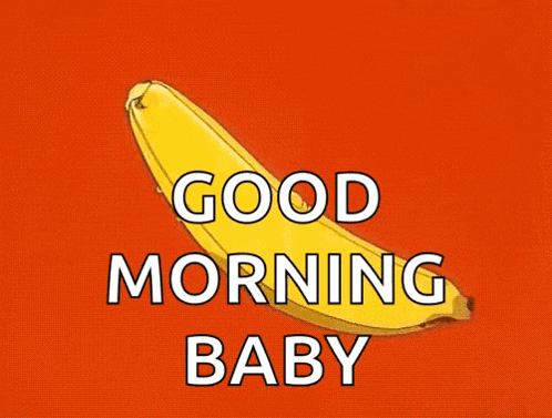 a banana is flying through the air with the words `` good morning baby '' written on it .