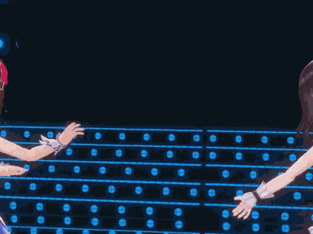 two anime girls are dancing in front of a row of lights