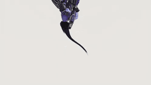 a purple robot with a purple face is holding a gun ..