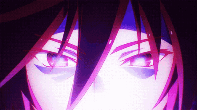 a close up of a person 's eyes with a purple glow