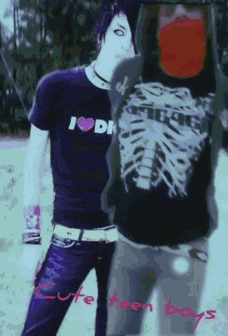 a boy wearing a purple shirt that says i heart di