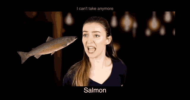 a woman is holding a fish in front of her face with the words " i can 't take anymore salmon " on the bottom