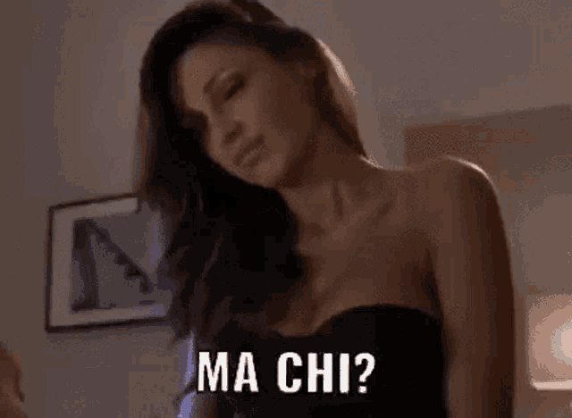 a woman in a black strapless top is asking ma chi ?