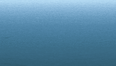 a blue water surface with a few waves