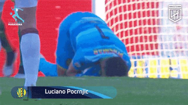 a soccer player named luciano pocrnjic kneeling down on the field