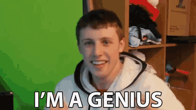 a young man says i 'm a genius in front of a green background