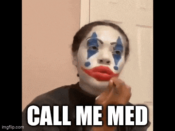 a woman is wearing a clown costume and applying makeup .