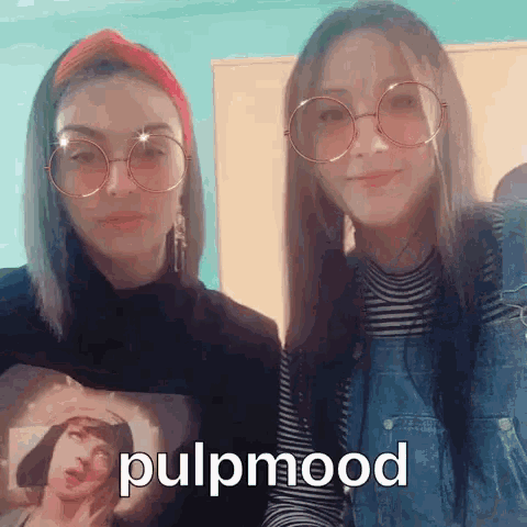 two girls wearing glasses and a t-shirt that says pulp mood