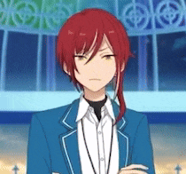 a man with red hair is wearing a blue jacket and a white shirt .