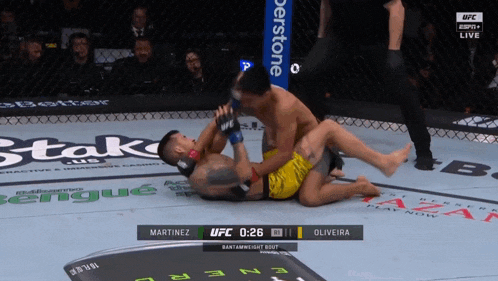 martirez and oliveira are fighting in a ufc ring